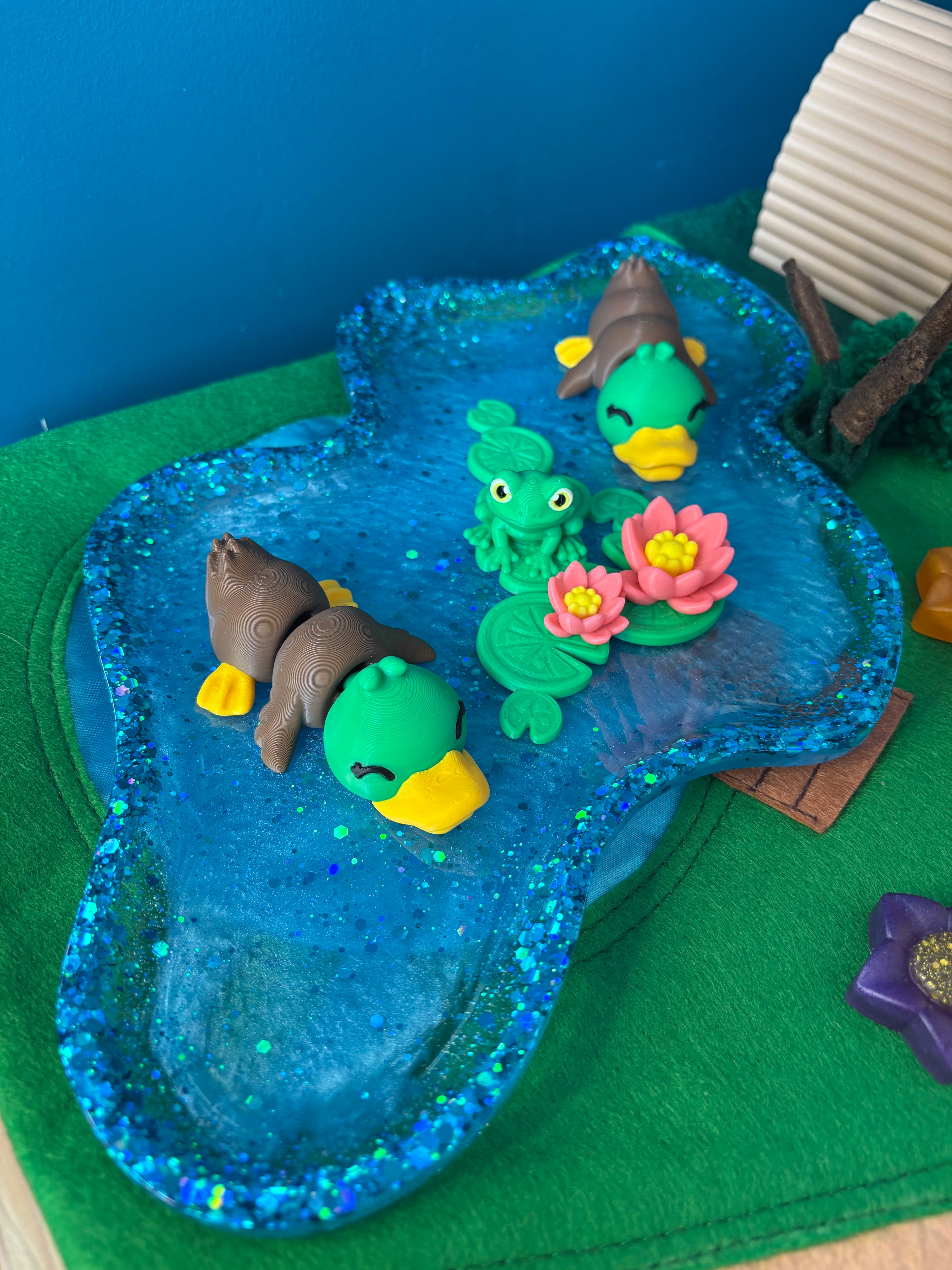 Duck and water lilies
