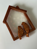 Seconds: resin bird ornament