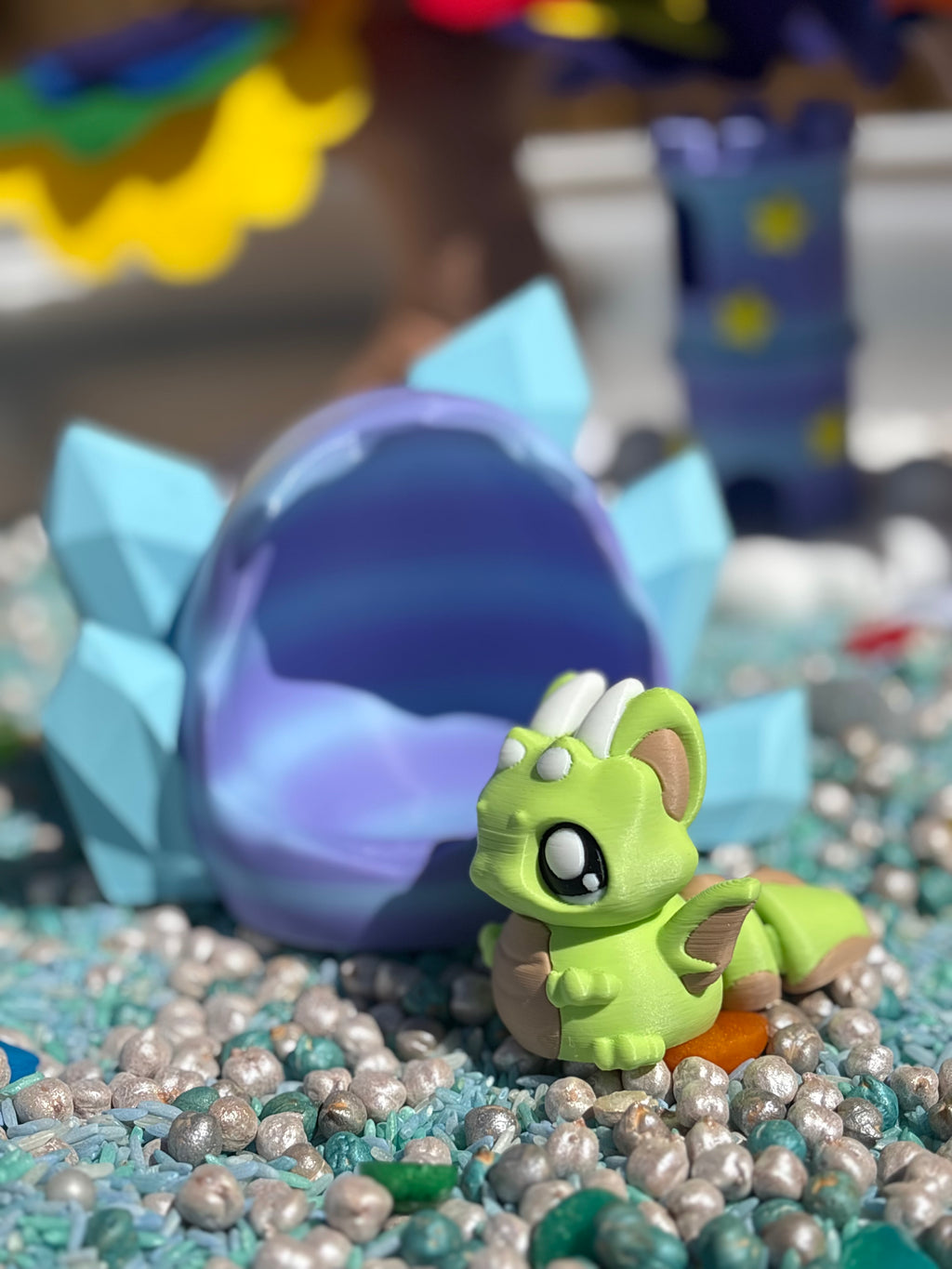 Baby dragon in a crystal egg