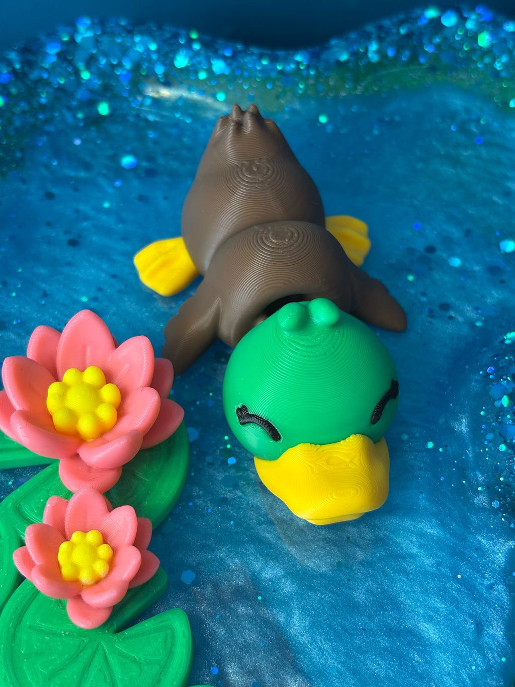 Duck and water lilies
